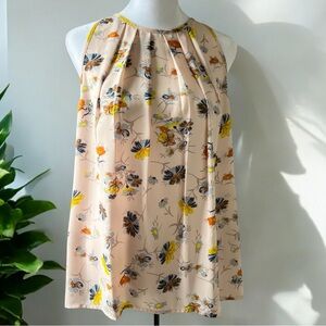 Ava Christine sleeveless floral flowy blouse with front pleating